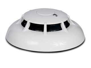 Inim ID100 Inim détecteur de fumée optique Iris conventionnelle (base du détecteur pas inclus).  Le détecteur de fumée optique ID100 est basé sur l'effet Tyndall (diffusion de la lumière) et fournit une alerte précoce en cas d'incendie.